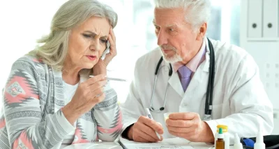 senior-doctor-with-elderly-patient